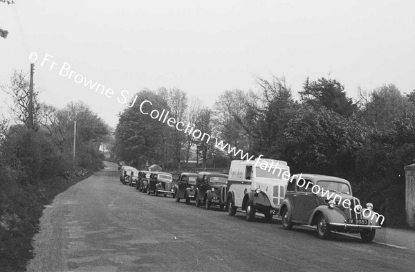 CARS AND TRACTOR AT MISSION TIME